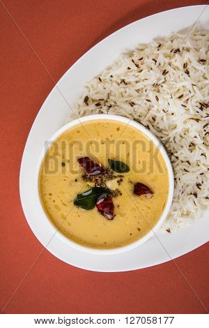 Whole Yellow Lentil with Rice, dal tadka and jeera rice, Indian Dish, cooked rice and cooked Arhar or Toor dal (Pigeon Pea)