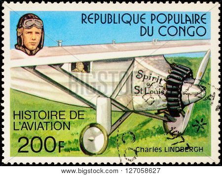 MOSCOW RUSSIA - APRIL 22 2016: A stamp printed in Congo shows American pilot Charles Lindbergh and his plane Spirit Of St.Louis (1927) series "Aviation History" circa 1977