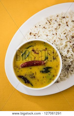 Whole Yellow Lentil with Rice, dal tadka and jeera rice, Indian Dish, cooked rice and cooked Arhar or Toor dal (Pigeon Pea)