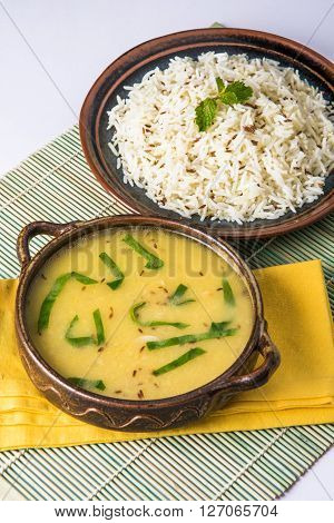 Whole Yellow Lentil with Rice, dal tadka and jeera rice, Indian Dish, cooked rice and cooked Arhar or Toor dal (Pigeon Pea)