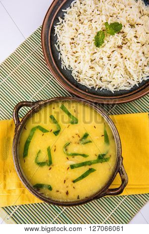 Whole Yellow Lentil with Rice, dal tadka and jeera rice, Indian Dish, cooked rice and cooked Arhar or Toor dal (Pigeon Pea)