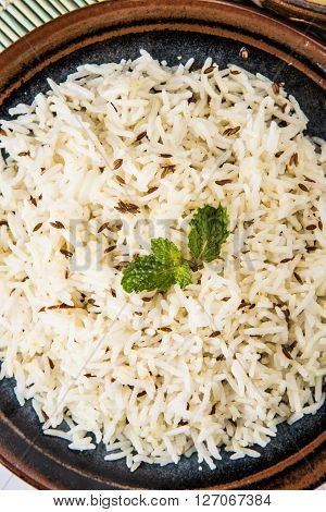 Whole Yellow Lentil with Rice, dal tadka and jeera rice, Indian Dish, cooked rice and cooked Arhar or Toor dal (Pigeon Pea), served in ceramic bowl
