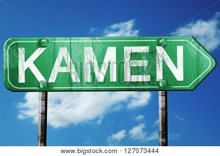 Kamen road sign, on a blue sky background