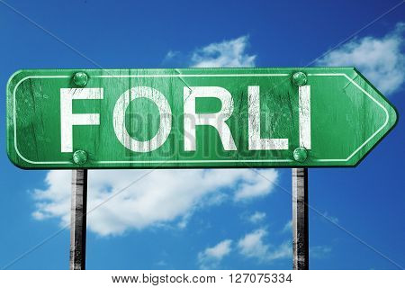 Forli road sign, on a blue sky background