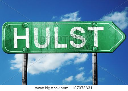 Hulst road sign, on a blue sky background