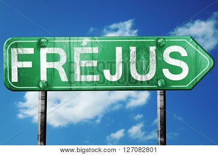 Frejus road sign, on a blue sky background