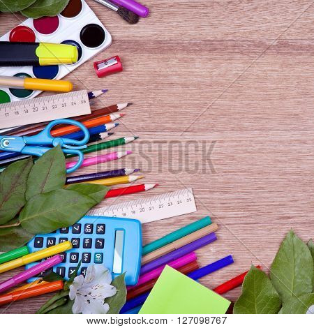 A lot of bright new items for creativity on a wooden table