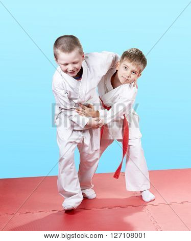 Kids in kindergarten are trained Judo technique