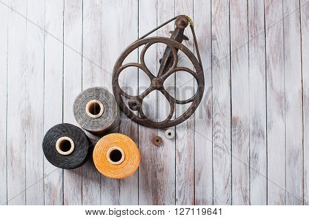 Set of sewing threads for shoes on a wooden  on background