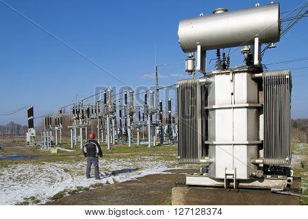 High voltage switchyard and transformers in electrical substation