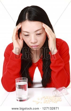 Japanese woman suffers from melancholy on white background