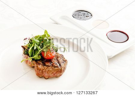 grilled steak with herbs