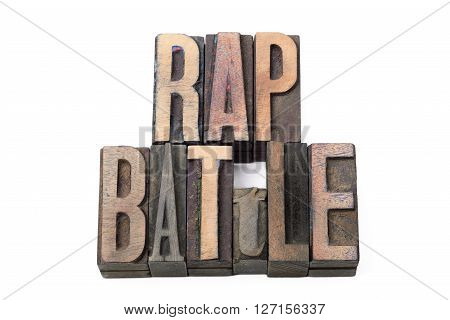 rap battle phrase made from vintage wooden letterpress type isolated on white