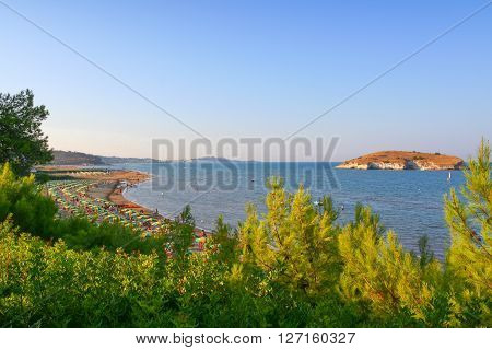 Summer seascape.Gargano coast: Portonuovo  beach .-(Apulia) ITALY-IT is a succession of fine sand dunes,crossed by many little kars streams,that cool the visitors in the hot summer time.