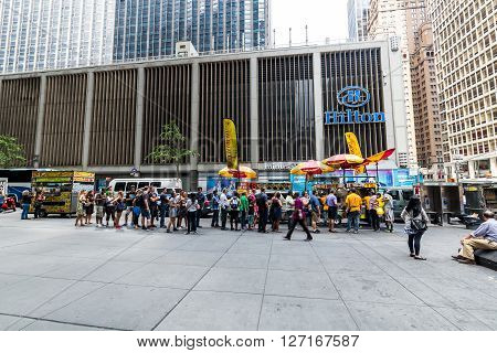NEW YORK - AUGUST 23, 2015: Views to the fast food stands at the Fifth Avenue New York on August 23, 2015. Fast food stands are very popular in Manhattan New York.