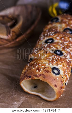 spicy hungarian a round loaf with olives and cheese