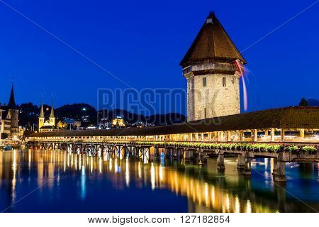 Lucerne, Switzerland - August 2: Views Of The Famous Bridge Kapellbruecke At Sunset In Lucerne On Au
