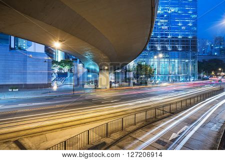 light trails in the downtown district,hong kong china.