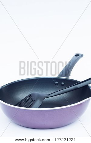 Non stick frying pan on white background, stock photo