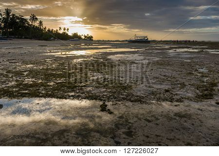 Sunrise and low tide at Panglao island of Philippines