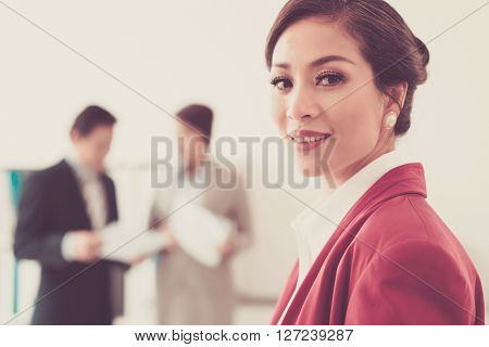 Portrait of attractive business lady smling at camera