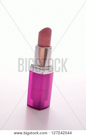 Pink lipstick on a white background beatuy and make up concept