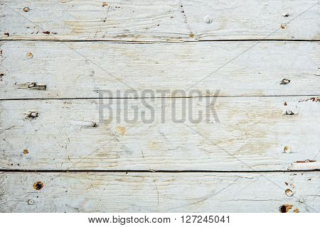 Old wooden board painted white. horizintal texture