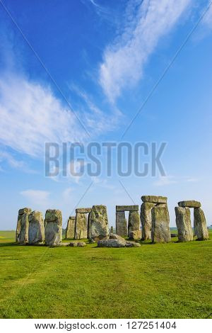 Stonehenge in Wiltshire in England in cloudy weather. It is a prehistoric monument 8 miles north from Salisbury in the place called Wiltshire in South West England. It is under protection of UNESCO.