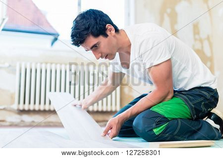 Floorer working in home in improvement project