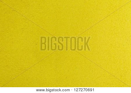 Eva foam ethylene vinyl acetate yellow surface sponge plush background