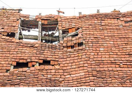 roof detail of a rundown old farmhouse in Southern Germany