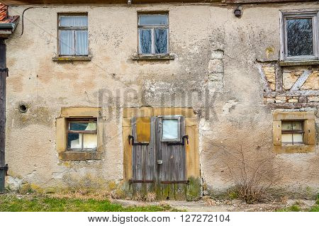 detail of a rundown old farmhouse in Southern Germany