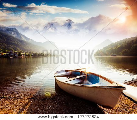 Fantastic views of the morning lake glowing by sunlight. Dramatic and picturesque scene. Location: resort Grundlsee, Liezen District of Styria, Austria, Alps. Europe. Beauty world. Instagram effect.