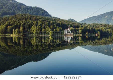 Fantastic views of the morning lake glowing by sunlight. Dramatic and picturesque scene. Location: resort Grundlsee, Liezen District of Styria, Austria, Alps. Europe. Beauty world. Instagram effect.