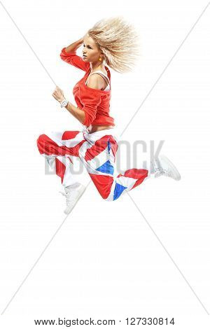 Beautiful girl in a crazy jumpin a red sports hip-hop clothing