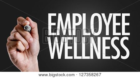 Hand writing the text: Employee Wellness