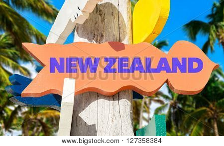 New Zealand signpost with palm trees