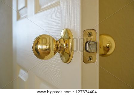 Close up view of an interior door and installed lockset.