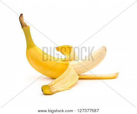 half unskin banana on a white background
