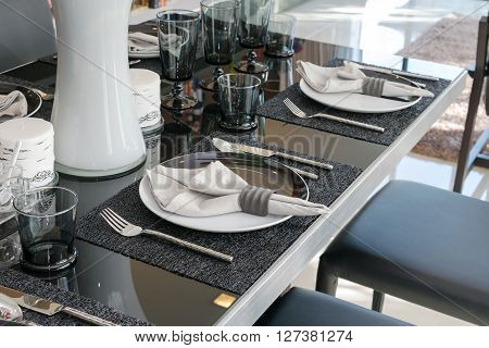 served with a plate on black table in modern dinning room