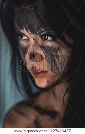 Spooky portrait of the woman. Demon theme on Halloween.