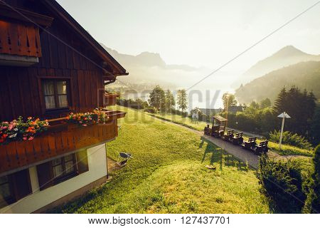 Fantastic views of the morning green garden that glows under sunlight. Dramatic scene. Location: resort Grundlsee, Liezen District of Styria, Austria, Alps. Europe. Beauty world. Instagram effect.
