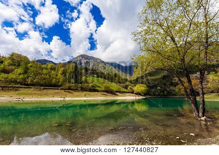 Turquoise Lake In The Mountains.