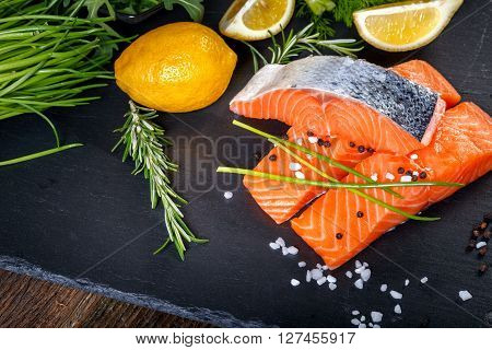 Salmon Filet Sliced On Three Parts With Lime And Herbs.