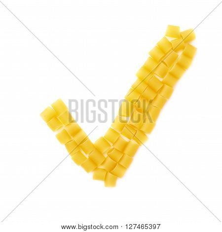 Yes tick sign symbol mark made of dry ditalini yellow pasta over isolated white background