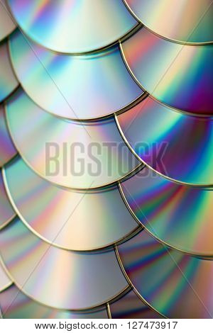 rainbow colorful background of many CD discs