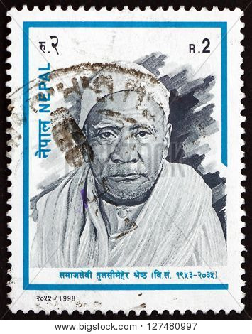 NEPAL - CIRCA 1998: a stamp printed in the Nepal shows Tulsi Meher Shrestha Social Worker circa 1998