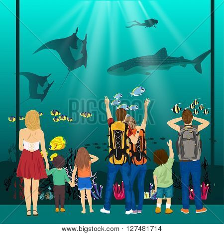 people watching underwater scenery with sea animals in a giant oceanarium