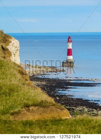 White chalk cliffs and aerial view of the Beachy Head Lighthouse Eastbourne East Sussex England