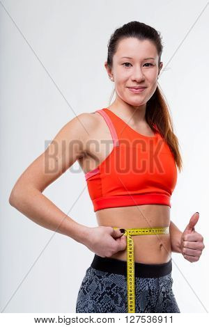 Woman Successful Workout Noticeable On Her Belly